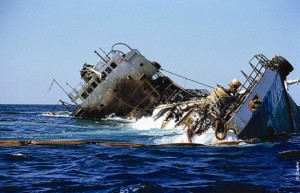The Jessica wreck surrounded with antipollution booms (Source: Cedre)